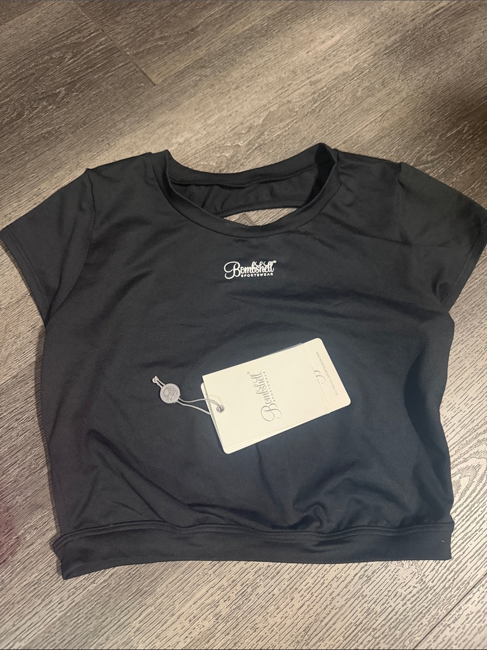 Bombshell Sportswear Black Short-Sleeve Cutout Top size XL